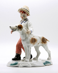 Фарфоровая статуэтка - мальчик с собакой